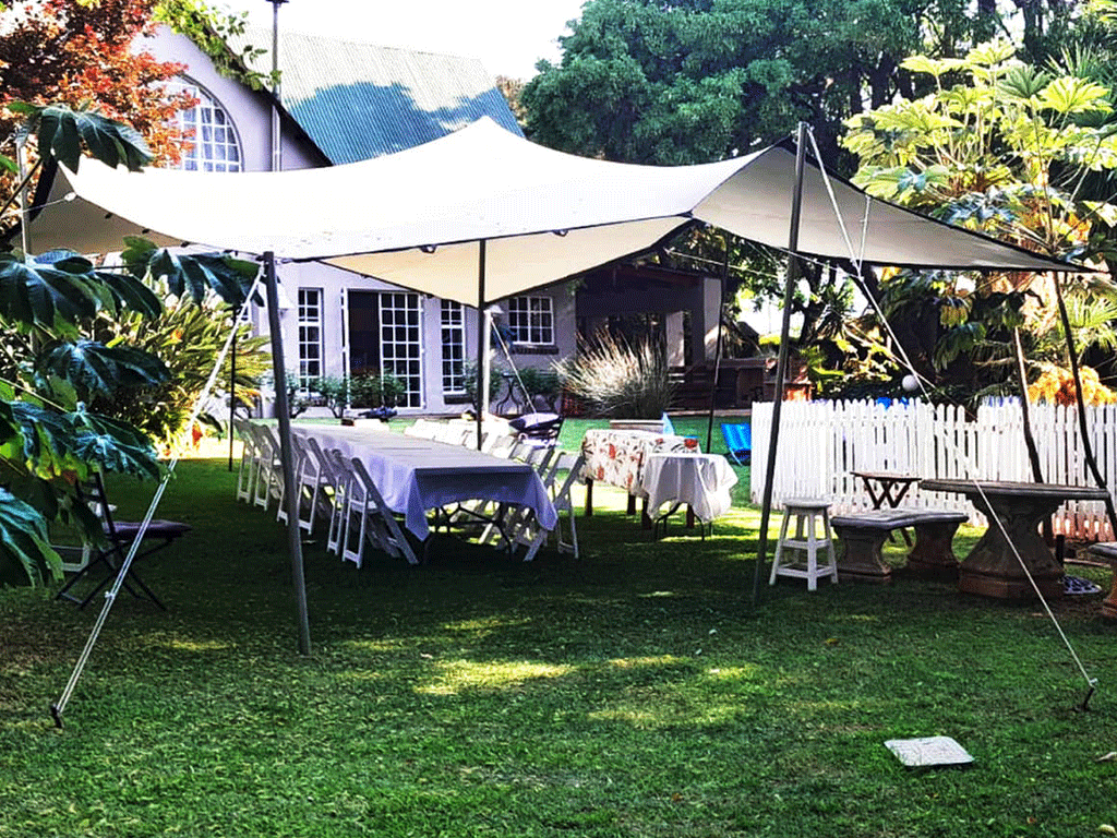 Garden event setup under stretch tents