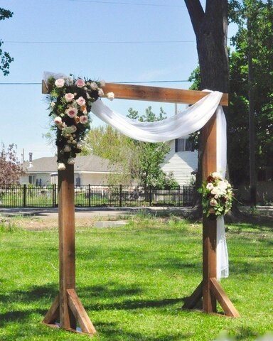 Rustic wooden wedding arch